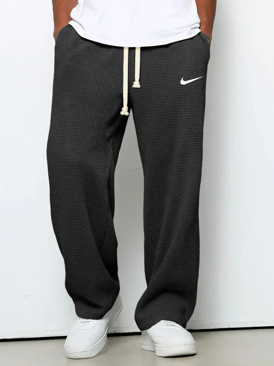NK™ Pantaloni con trama goffrata