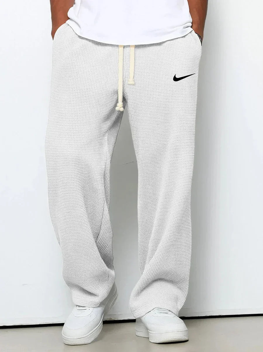 NK™ Pantaloni con trama goffrata